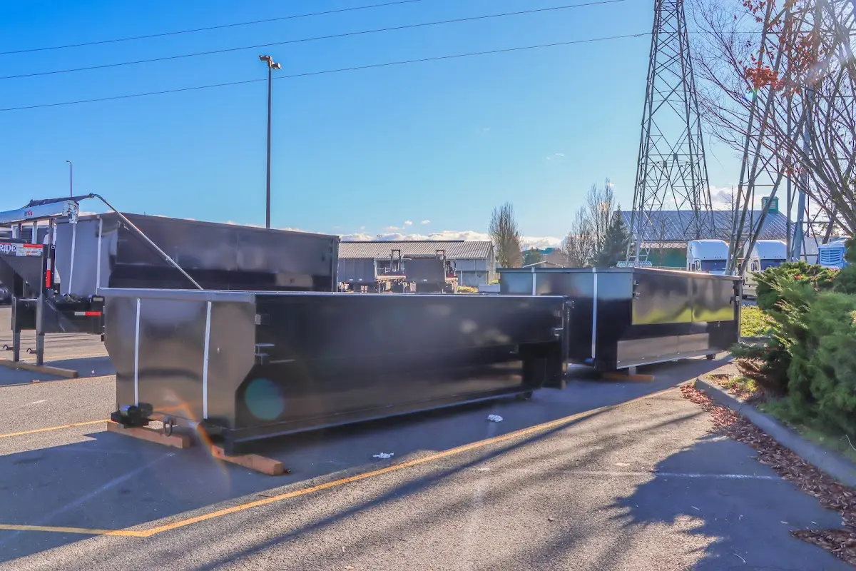 Roll-off dumpster ready for waste disposal at job site for 3 Yard Dumpster Rental in Marlborough